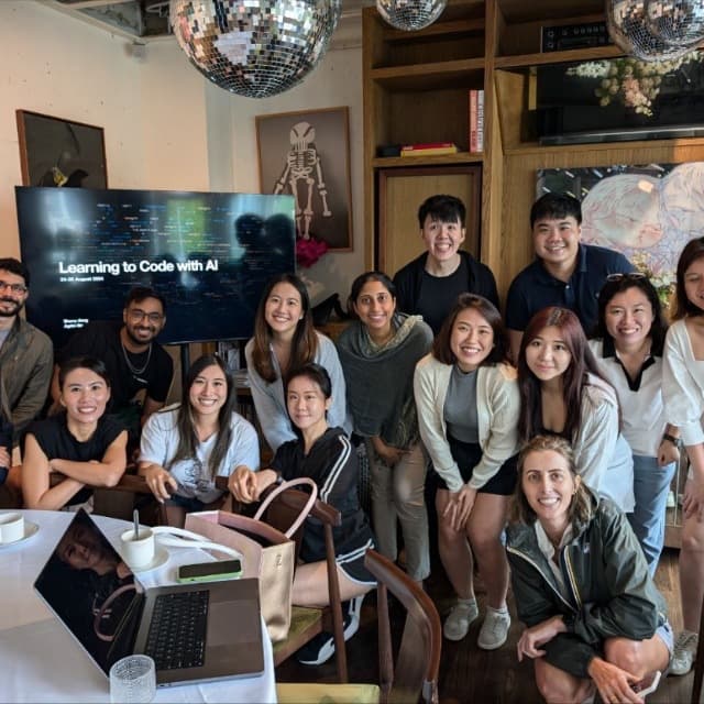 Students coding together